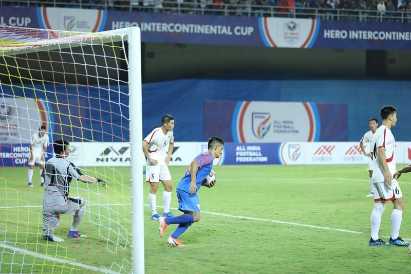 Sunil Chhetri takes the ball in his hand to restart the game quickly after scoring India&#039;s second goal against DPR Korea in the Intercontinental Cup