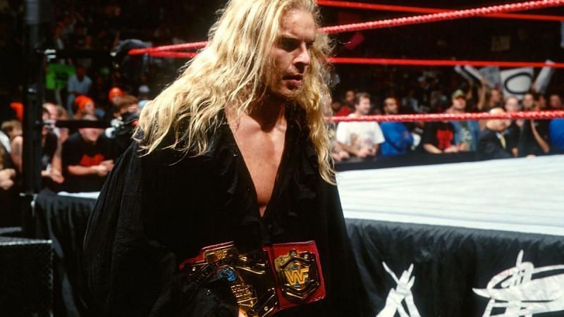 Christian with his WWF Light Heavyweight Title which he won in his debut.