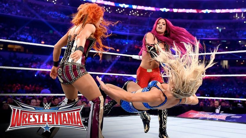 Lynch, Sasha, and Charlotte at WrestleMania 32