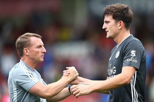 Harry Maguire (R) is reportedly on the brink of a move to Manchester United