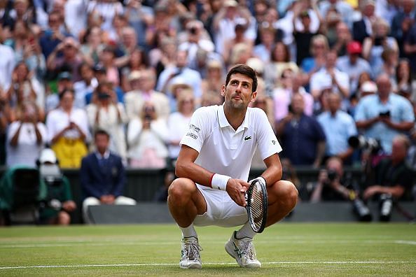 Novak Djokovic saves multiple championship points against  Federer to win a fifth Wimbledon title