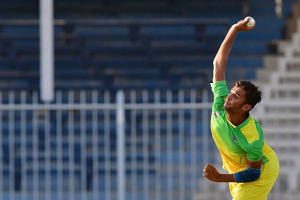 Azmatullah Omarzai about to deliver a ball