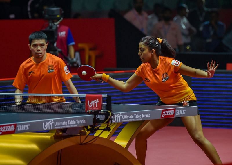 Chuang and Ayhika in action during the mixed doubles match