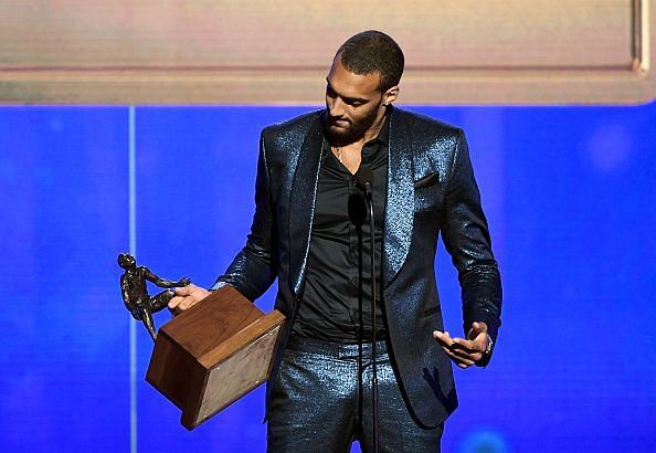 Jazz Center Rudy Gobert with the 2019 Defensive Player of the Year Award