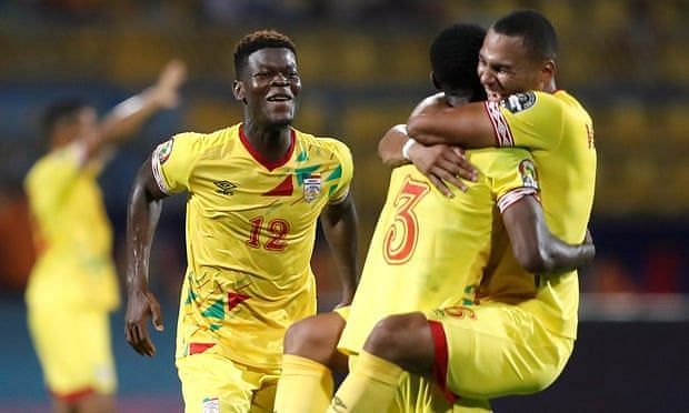 Benin celebrate their round of 16 entrance after holding Cameroon to a draw