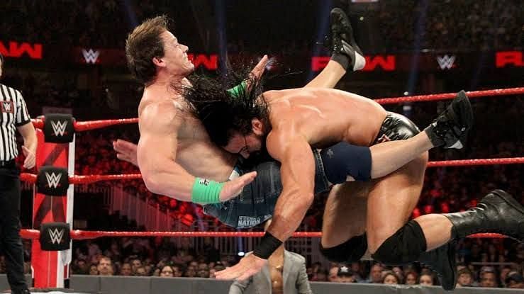Cena and McIntyre in action