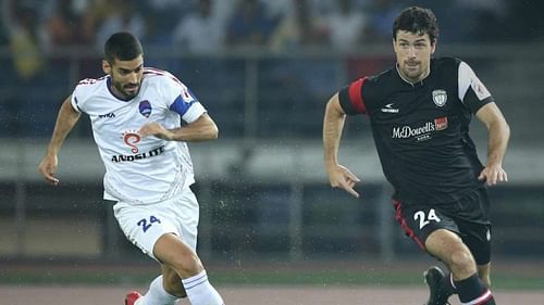 Marti Crespi (left) tussles for the ball with Juan Mascia (right) in the ISL