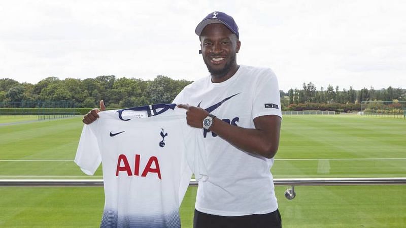 Ndombele poses with his new colours at their training ground this week