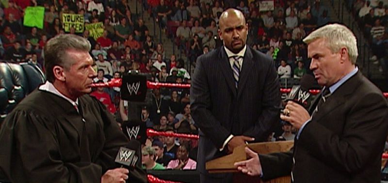 Vince McMahon, Jonathan Coachman and Eric Bischoff