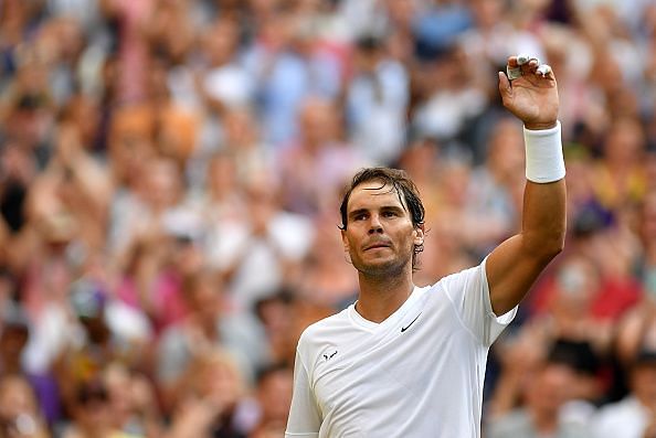 Nadal acknowledges the crowd after his second-round win at the Championships - Wimbledon 2019