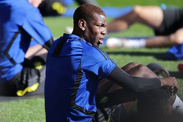 Paul Pogba has reported for Manchester United&#039;s pre-season training amid an uncertain future.