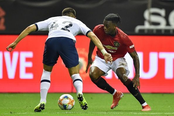 Aaron Wan-Bissaka (in red)