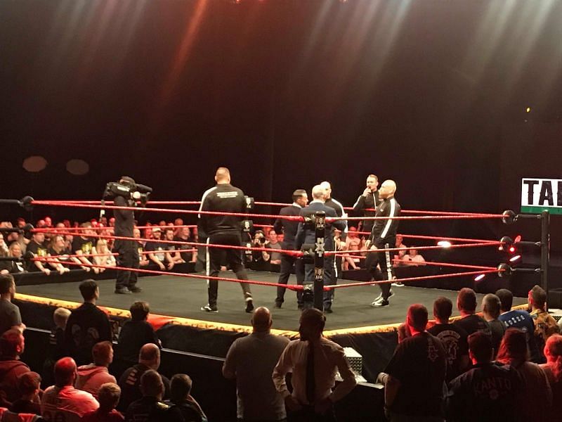 Imperium surrounded Johnny Saint but was soon confronted by Tyler Bate