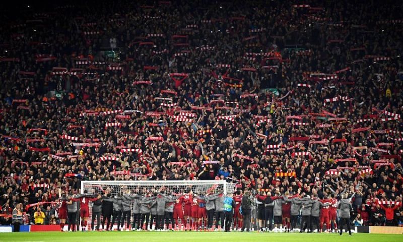 Liverpool players and staff celebrating their comeback against FC Barcelona