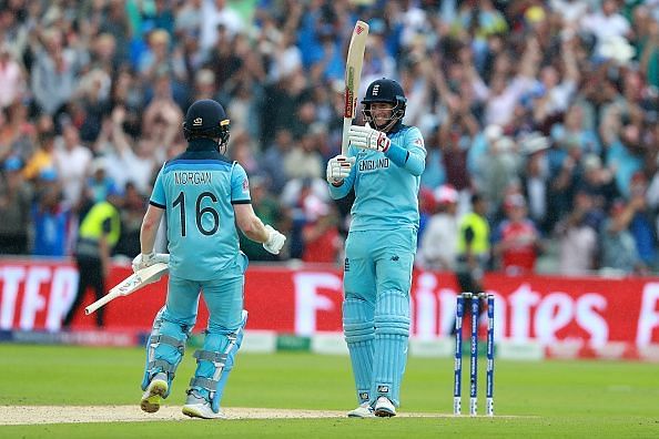 Joe Root and Eoin Morgan celebrate a job well done on Thursday.