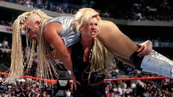 Sable delivers the match-winning TKO to Luna Vachon at Wrestlemania XIV