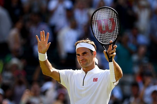 Roger Federer acknowledges applause after his second-round victory.