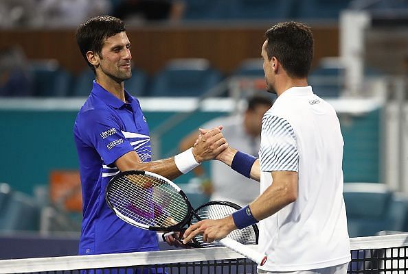 Novak Djokovic(L) and Roberto Bautista Agut