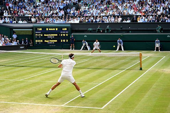 Djokovic saves two championship points on the Federer serve to prevail in historic deciding set Wimbledon tiebreak