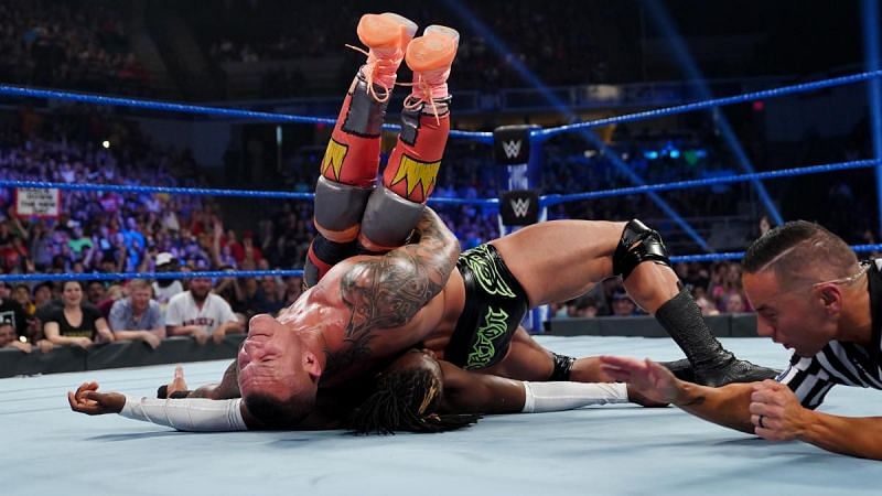 Randy Orton pinning Kofi Kingston