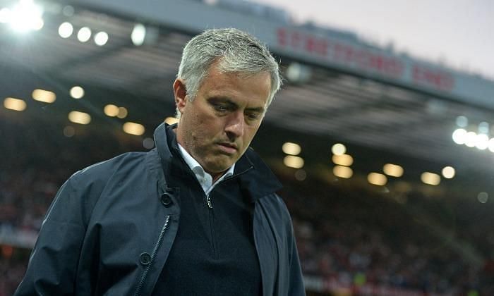 Jose Mourinho looks down in disappointment