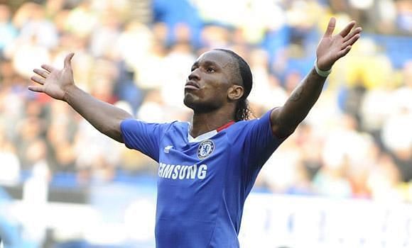 Drogba doing what he does best...