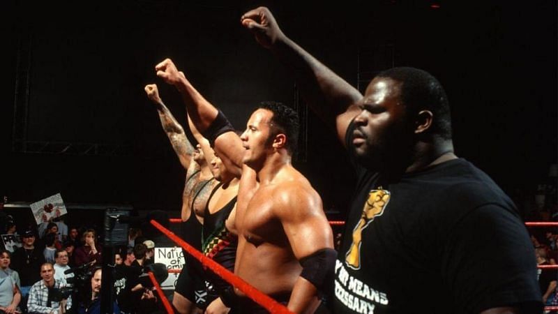 Nation of Domination: Mark Henry, The Rock, Kama Mustafa, and D-Lo Brown. Not pictured is the group&#039;s founder, Ron 