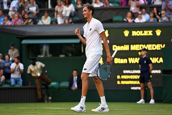 Medvedev exults after beating Wawrinka in the first round at 2017 Wimbledon