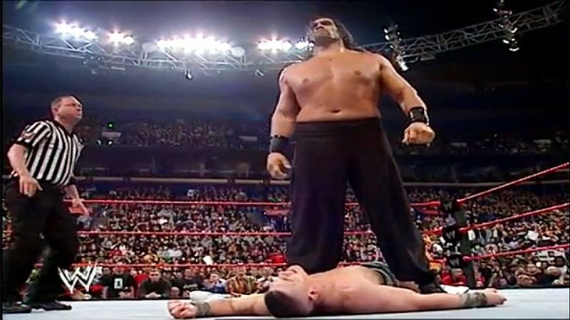 Khali stands tall over Cena