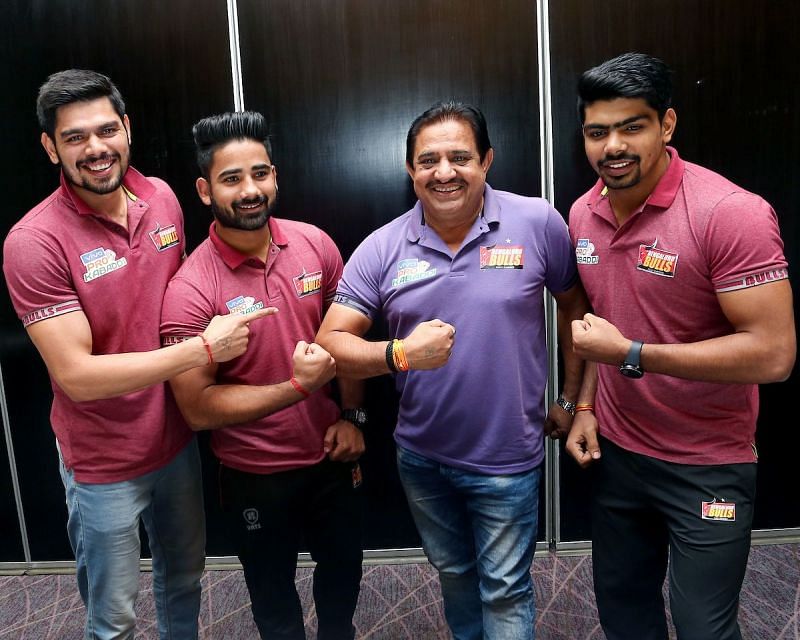 From L-R: Rohit Kumar, Mahender Singh, Randhir Singh Sehrawat (Coach), Pawan Sehrawat