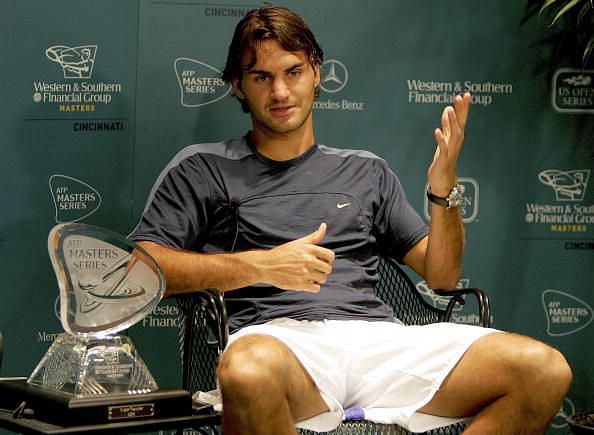 Federer poses with his 1st Cincinnati trophy in 2005