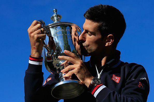 2015 US Open champion Novak Djokovic poses with his second US Open trophy