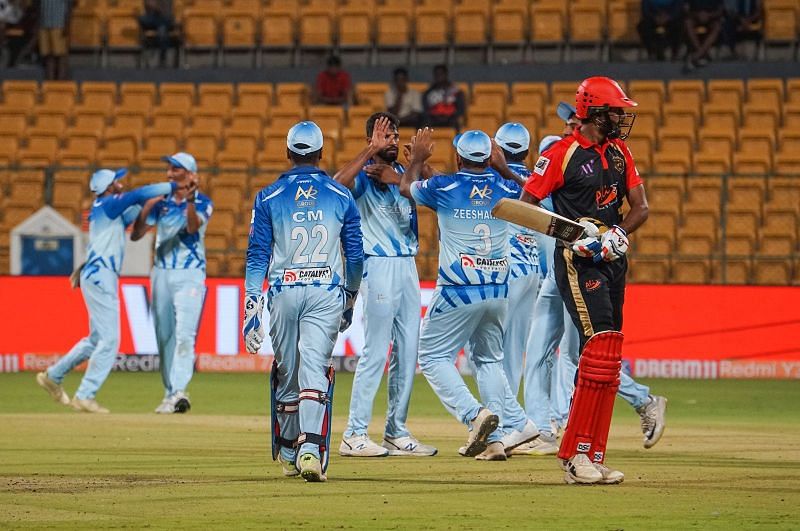 Ballari Tuskers celebrate the fall of a wicket