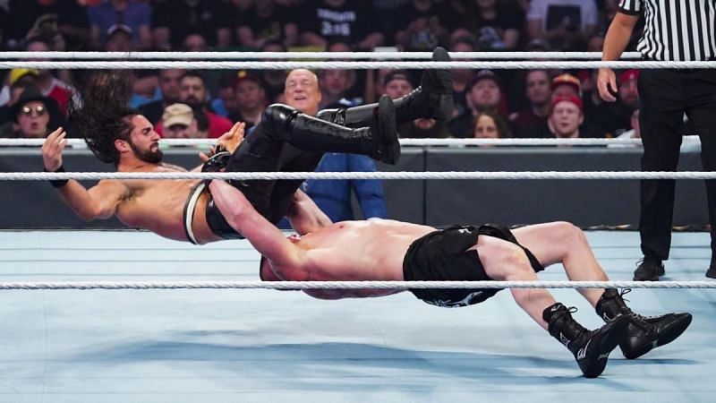 Brock Lesnar with his trademark suplex on Seth Rollins