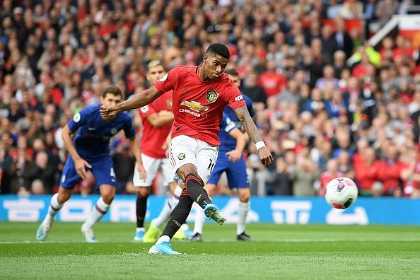 Marcus Rashford scores from the spot against Chelsea at Old Trafford