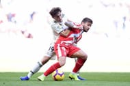 Christian Portu (in red) in Real Madrid CF v Girona FC - La Liga