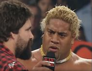 Rikishi Fatu and Mick Foley (at the time Raw's general manager.)