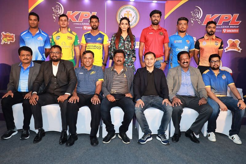 Enter captioPlayers&Acirc;&nbsp;(Standing L-R)&Acirc;&nbsp;CM Gautam (Ballari Tuskers), Bharath Chipli (Bijapur Bulls), Amit Verma (Mysuru Warriors), Kannada actress and KPL Brand Ambassador Ms. Ragini Dwivedi, Mir&Acirc;&nbsp;Kaunain Abbas (Belagavi Panthers), Jonathan Rongsen (Bengaluru Blasters) and KB Pawan.Team representatives&Acirc;&nbsp;(Sitting L-R)&Acirc;&nbsp;R Shailesh (Ballari Tuskers), Kiran Kattimani (Bijapur Bulls), Arjun Ranga (Mysuru Warriors), R Kumar (Shivamogga Lions), Ali Asfak Thara (Belagavi Panthers), Mohan Raju (Bengaluru Blasters) and Abhishek Jindal (Hubli Tigers)&Acirc;&nbsp;