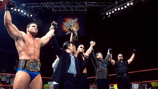 The Corporation: Ken Shamrock, Vince McMahon, the Rock, Gerald Brisco, and Pat Patterson.