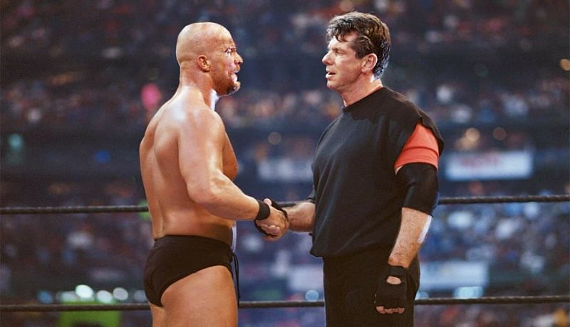Hell freezes over: Stone Cold and Vince McMahon shake hands at Wrestlemania 17.