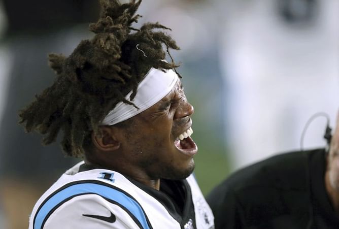 Newton injures foot, Brady solid in Patriots' 10-3 win