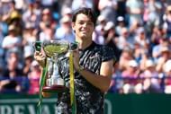 Fritz hoists aloft his first singles trophy in Eastbourne.