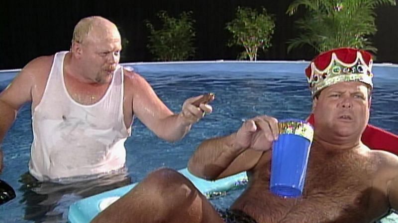 TL Hopper annoys Jerry Lawler while the King relaxes in his pool.