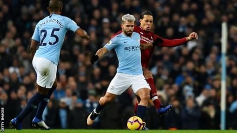 City striker Sergio Aguero and Liverpool defender Virgil Van Dijk in a duel