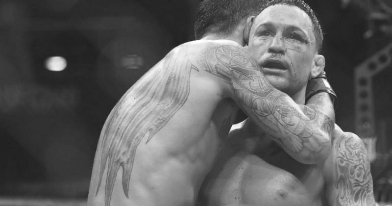 Max Holloway hugging Frankie Edgar after the UFC 240 main event.