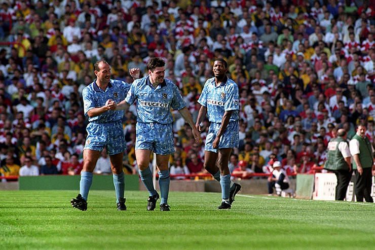 Quinn (centre) served Arsenal a baptism of fire in 1993