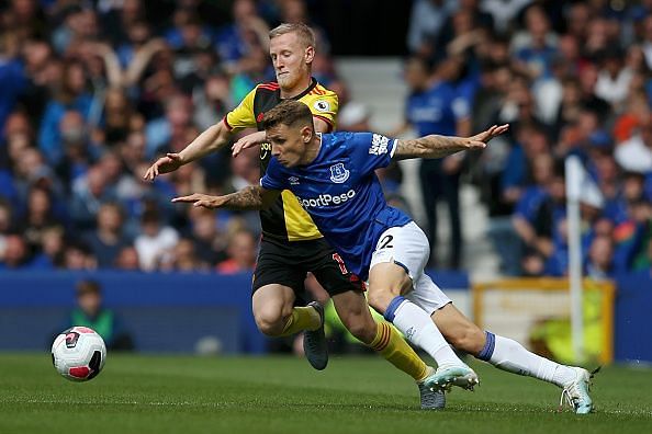 Lucas Digne in a fight for the ball.