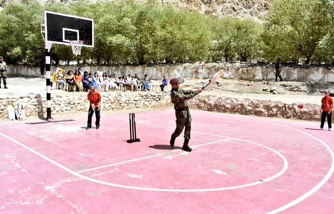 MS Dhoni enjoys a game of cricket with children in Leh. (PC- CSK Twitter)