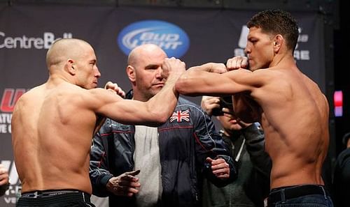 GSP (left) isn't returning to the Octagon anytime soon