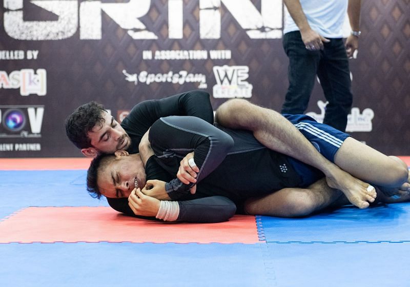 Rachit Tyagi of Crosstrain Fight Club dominates his opponent on the mats at GRIND 3.